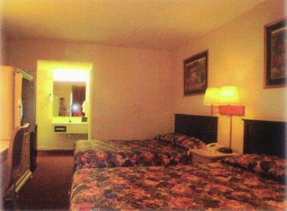 Houston Inn And Suites Quarto foto